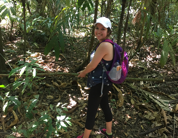 College of the Mainland student Bethel Moreno hikes through the jungle in Belize on a college study abroad trip.