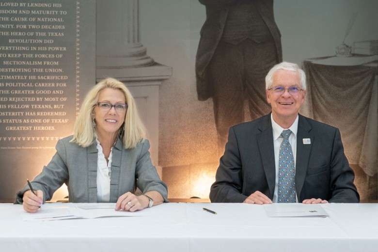 Sam Houston State University President, Dr. Dana G. Hoyt and College of the Mainland President, Dr. Warren Nichols signing agreement