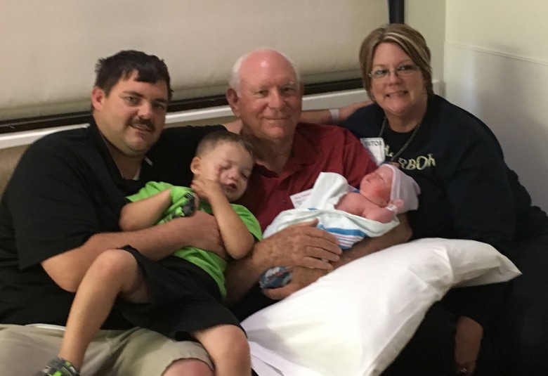 Don Gartman with his newest great-grandchild born May 2 and family members.