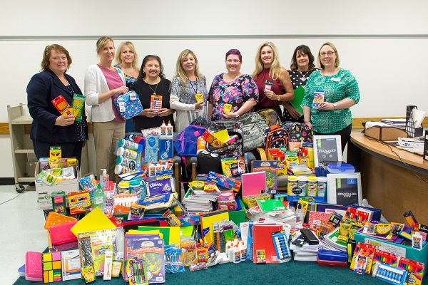 COMPeers Donate School Supplies to Santa Fe Schools