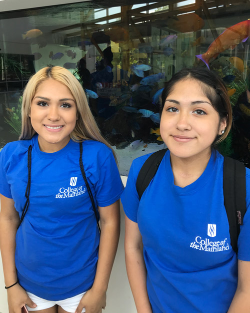 Two female COM students at 2018 Summer Bridge trip